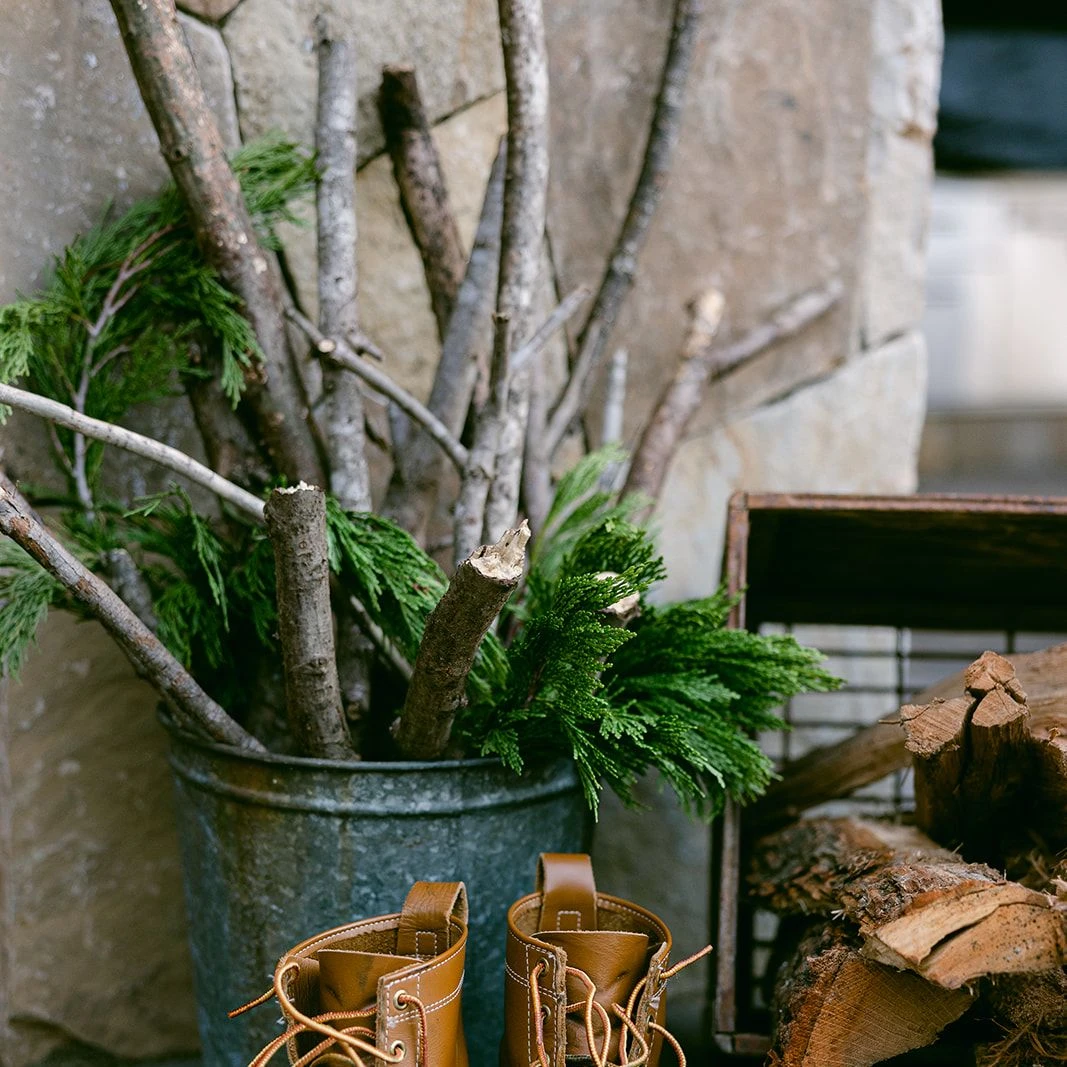 boots with sticks and garland