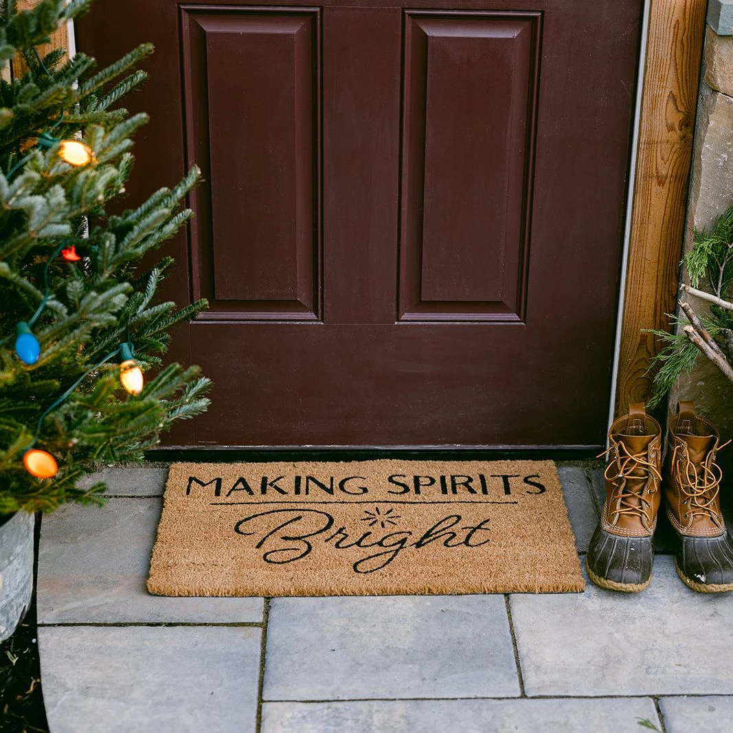 doorway with christmas tree and lights