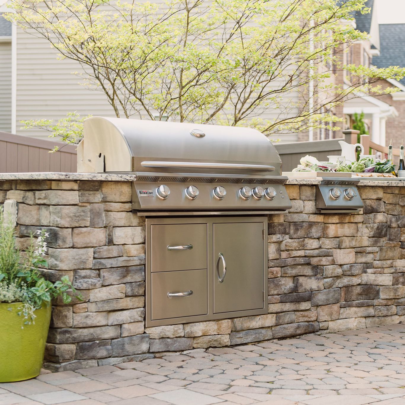 Grill Island with granite counter and Eldorado Stone veneer.