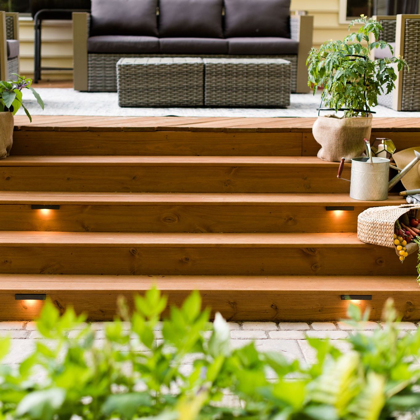 Wide deck steps with container gardening