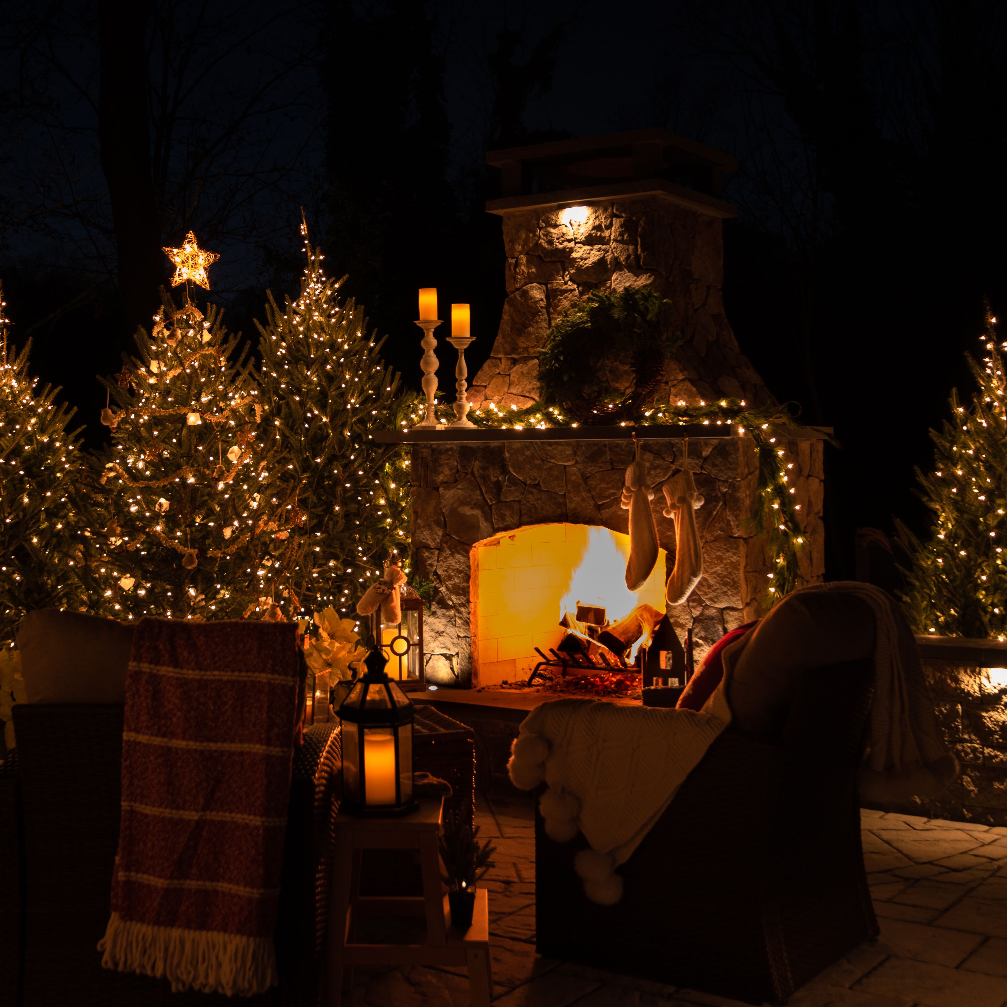 	Warm, decorated firplace ready for Christmas gatherings