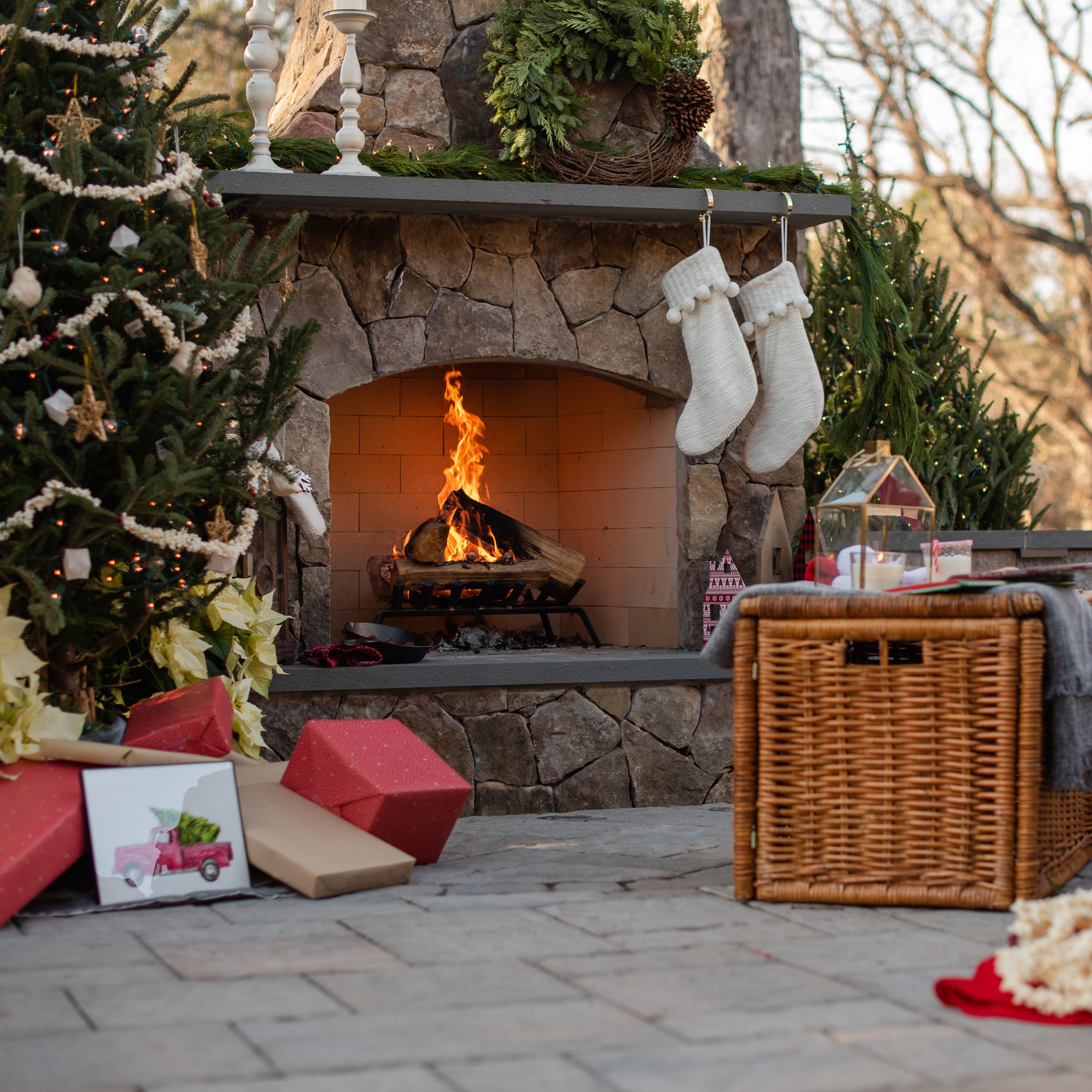 Stone fireplace decorated for the holidays